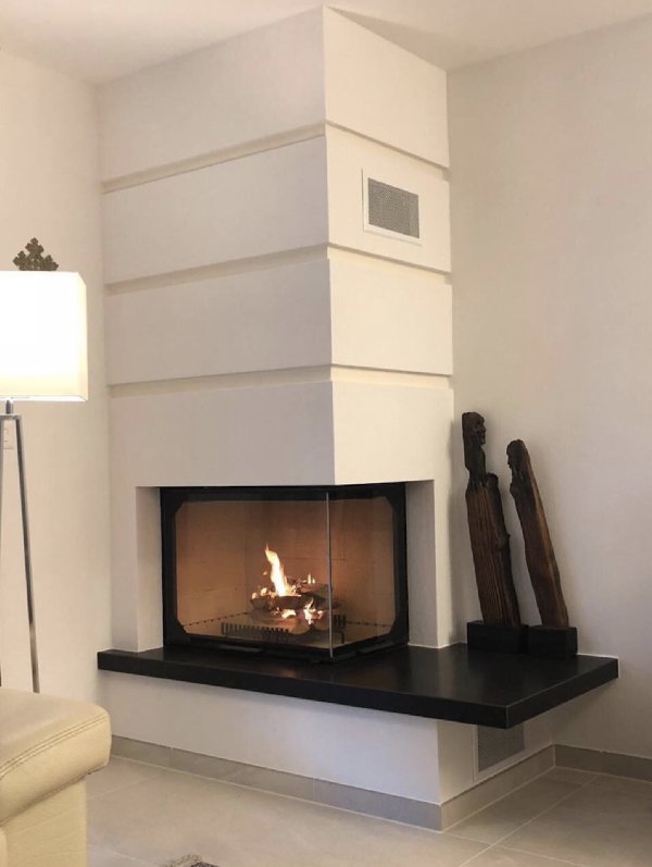 Side window fireplace with a granite base - Carron-Lugon